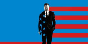 Man in a black suit standing against a blue background with red horizontal stripes and blue star patterns overlaying his torso, symbolizing the United States.